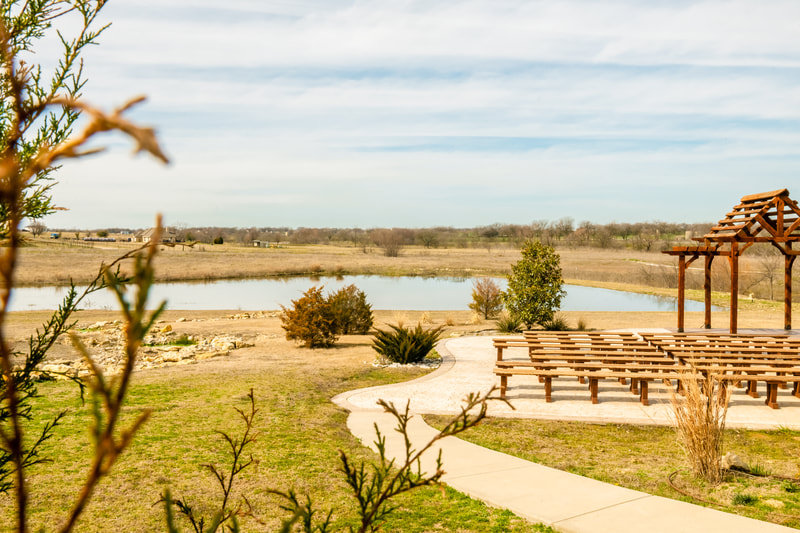 fort worth wedding venue outdoor ceremony patio lake front view