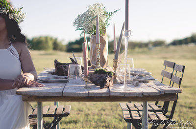 boho style with wooden accents, muted colors, and outdoor reception
