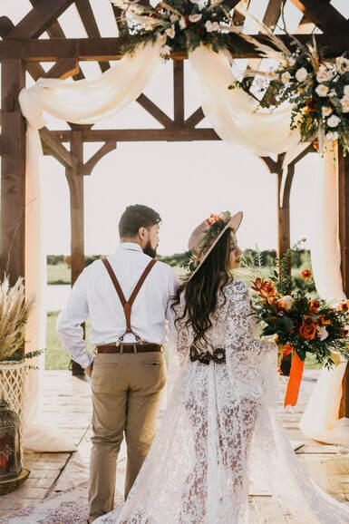 outdoor boho ceremony photographed by april pinto photography