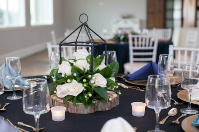 centerpiece floral ideas, north texas inclusive venue, wedding venue with decor, lantern inspiration with roses