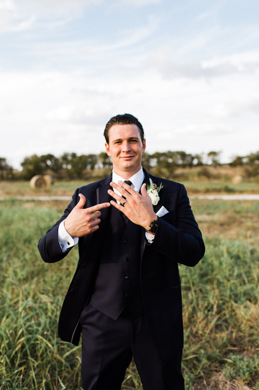 who pays for the wedding, groom in field with a tux, north texas hillside ranch