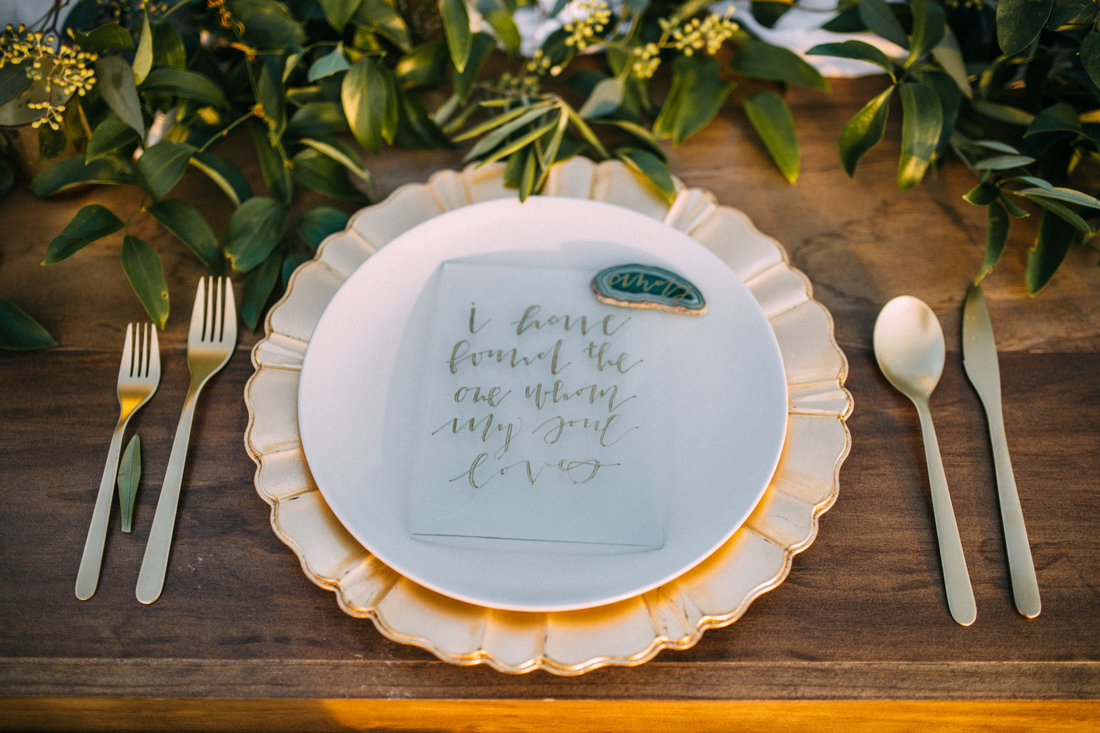 hand written geode placecards, gold flatware and chargers, boho  garden event decor inspiration in north texas