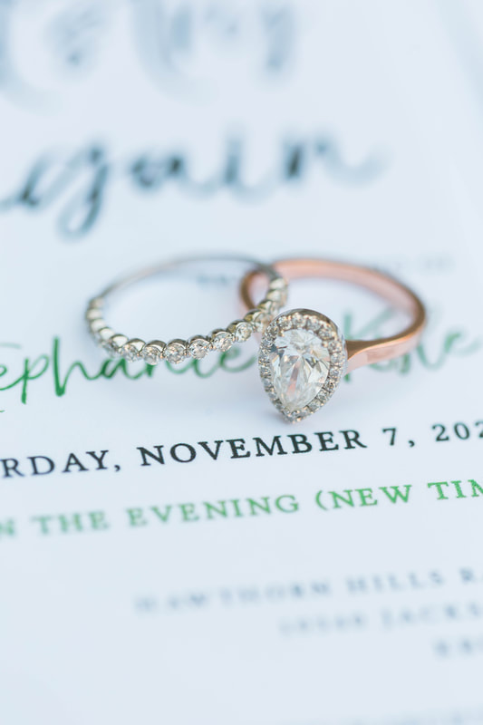 stunning wedding ring on wedding invitation